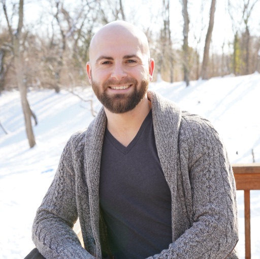 Jake Sebok, Master Certified Professional Coach, head-and-shoulders portrait in warm light
